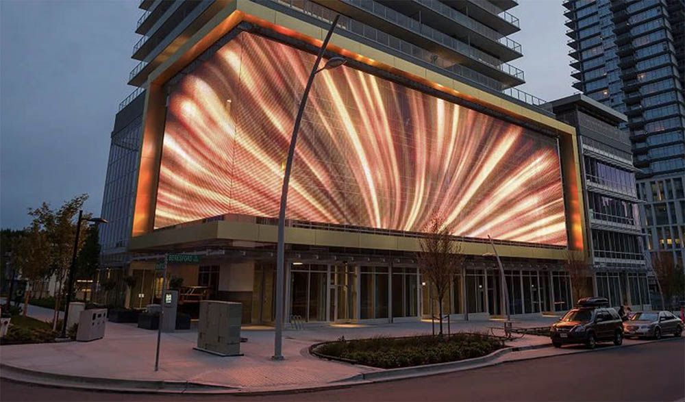  A rendering of the three-storey digital art screen on Gold House in Burnaby. The public art display has never been illuminated because of a dispute between the strata council and owners of commercial units over its power supply.